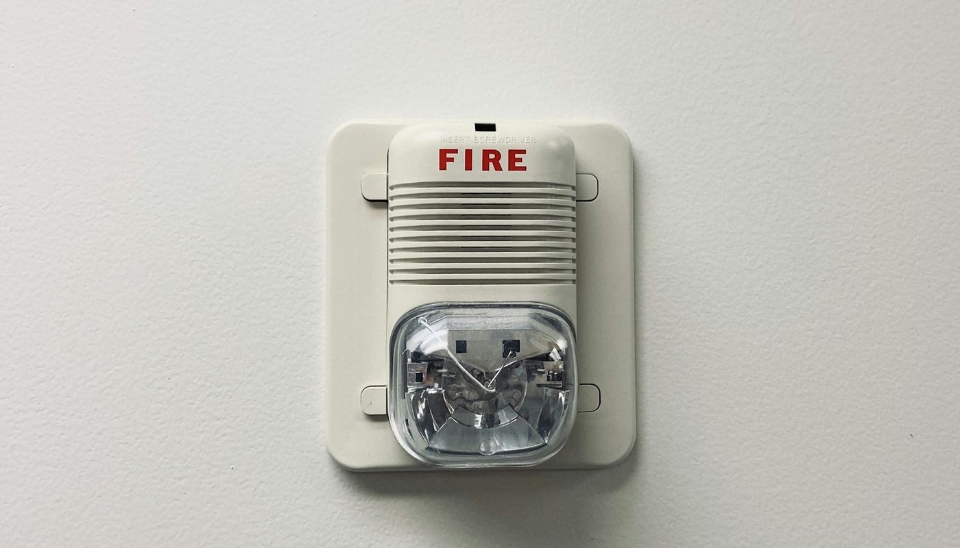 Wall-mounted fire alarm sounder and strobe